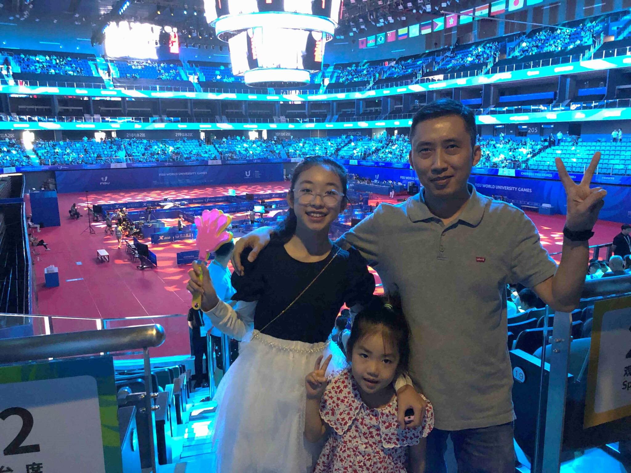 03   7 year old Jiang enjoyed the Ping pong finals with her dad and little sister