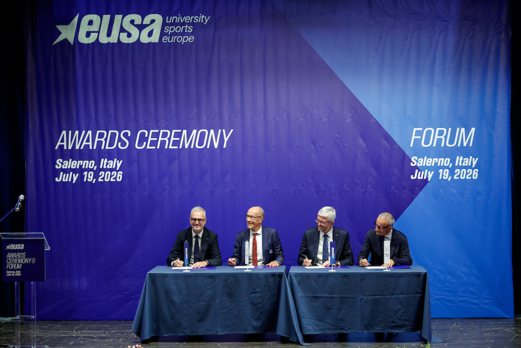 Four individuals are seated at a table during the EUA Awards Ceremony and Forum in Salerno, Italy, on July 19, 2026.